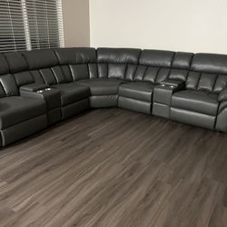 New Reversible Sectional.  Grey Gel Leatherette.  