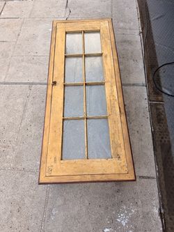 Coffee table with antique door inset