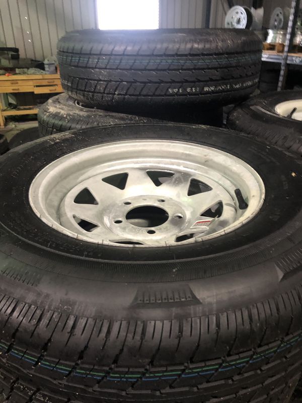 14” 5 lug trailer tires. 205/75/14 on galv 5 lug rims. Makes great boat trailer tires - we will install on your trailer for free - new date codes