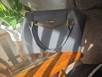 Joy & Iman purse