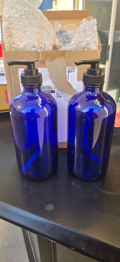 2 Blue Glass Liquid Pumps