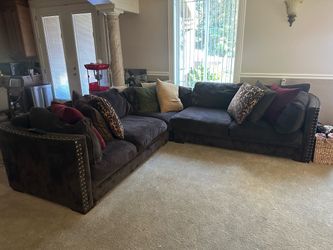 Down‑Filled Sectional Sofa + Matching Studded Armchair