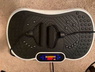 plataforma vibratoria para ejercicio con pantalla digital y bandas.