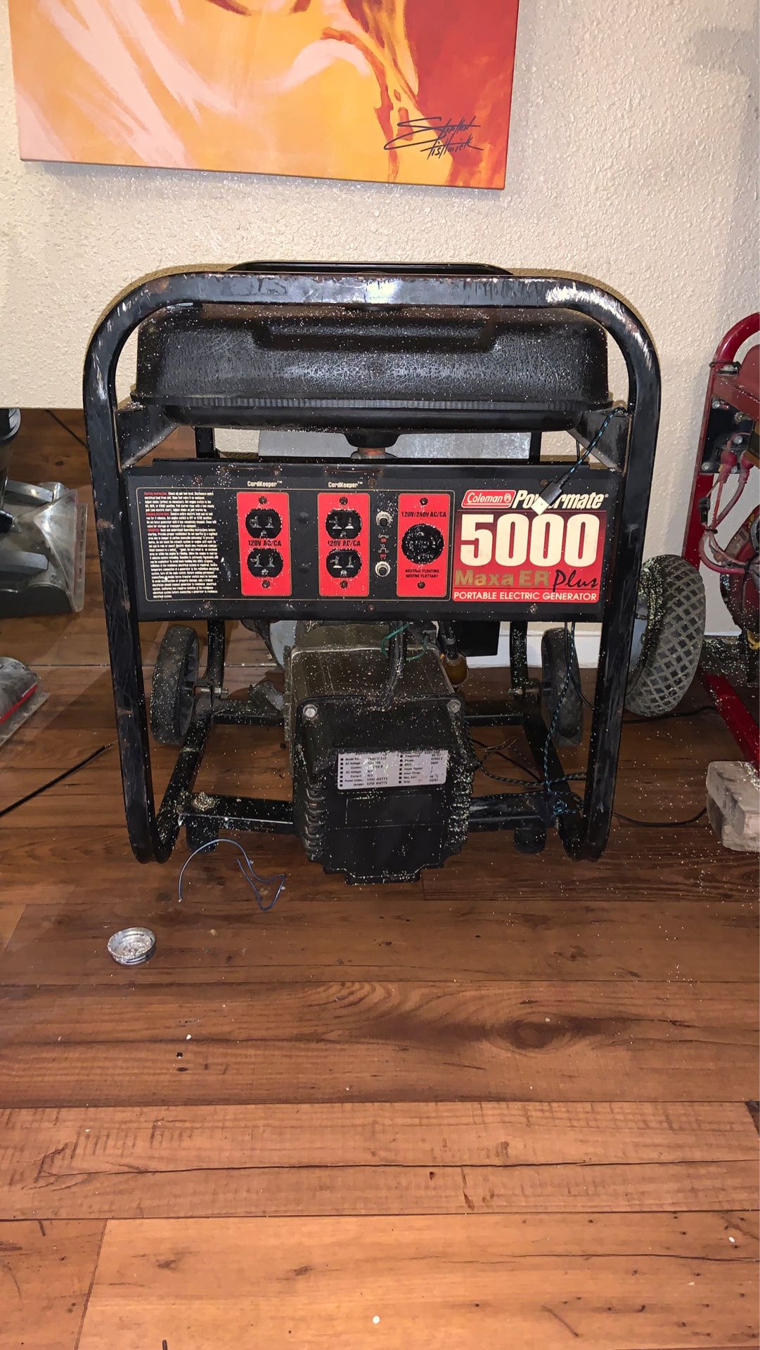 Coleman powermate 5000 maxa ER plus portable electric generator