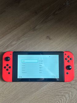 Nintendo Switch Bundle: Extra Controller + 2 Games