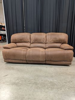 Brown Faux Leather Three-Seat Reclining Couch