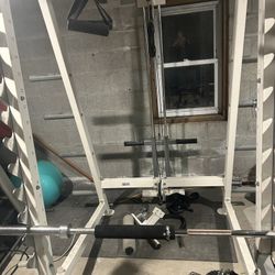 Squat Rack, Bar, Bench, And Weights 