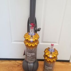 NEW condition  Dyson FLOOR VACUUM  , WITH ATTACHMENT   , AMAZING POWER SUCTION  , WORKS EXCELLENT  , 