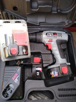 SKILL 12V DRILL WITH CHARGER, CASE, NEW BATTERY PACK AND 2 ADDITIONAL BATTERIES