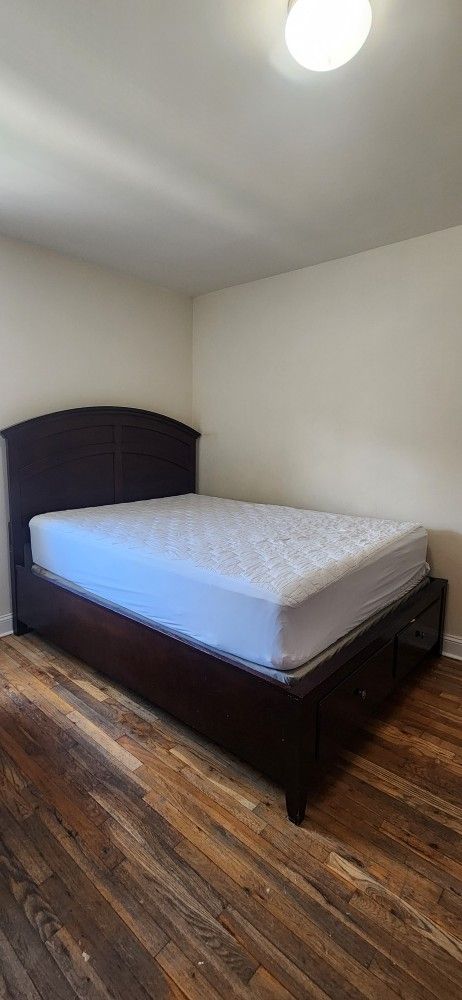 Queen Size Bed + Dresser With Mirror ( RAYMOUR AND FLANIGAN)