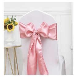 Pink satin bows for banquet chairs