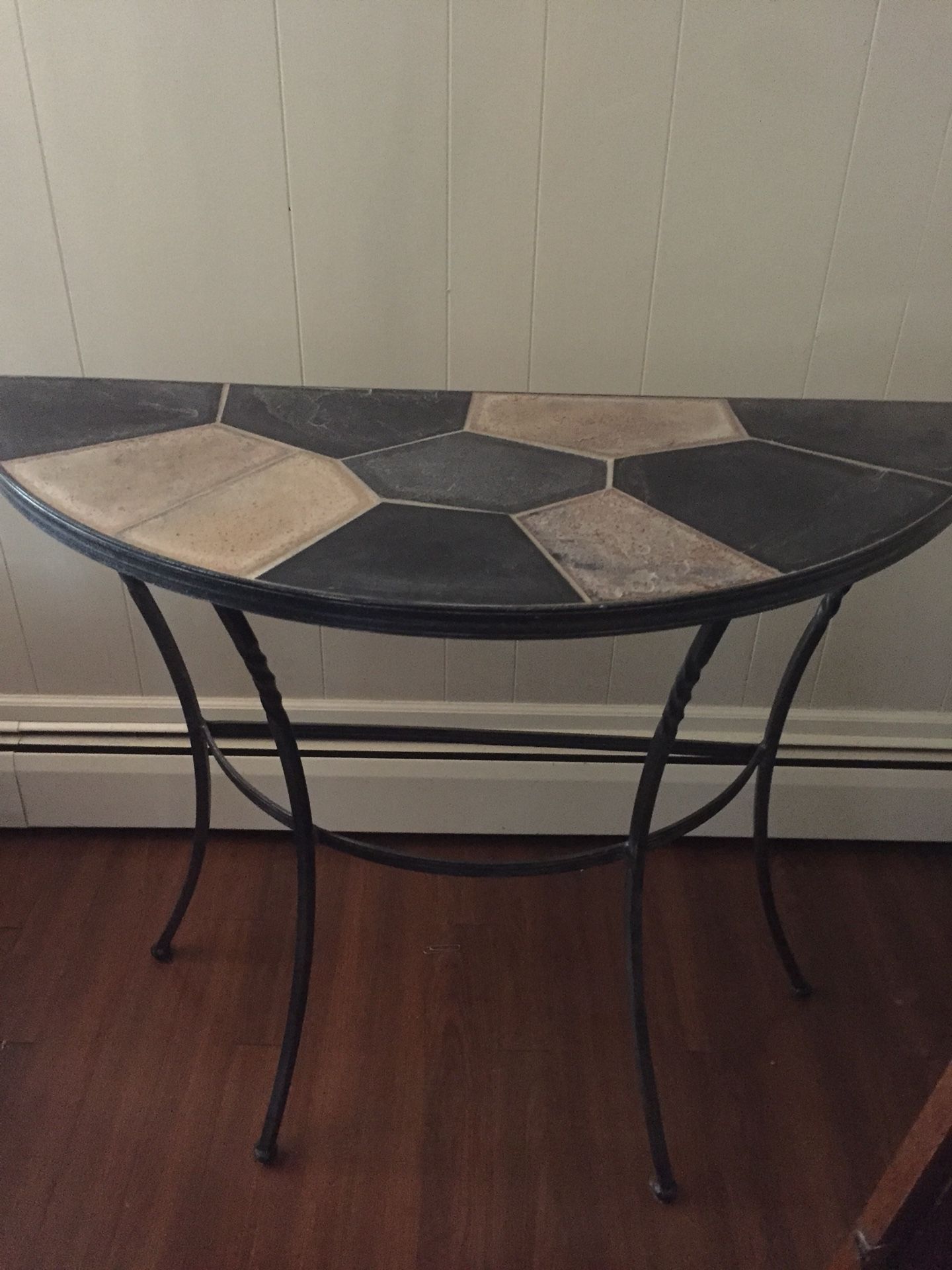 Pier One slate top table with metal legs.