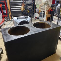 2 12 in. Double baffled mdf box tuned to 32hz