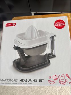 New Dash SmartStore Measuring Set & Citrus Juicer  Description: A clever, multi-piece kitchen prep set that combines measuring tools and a manual citr