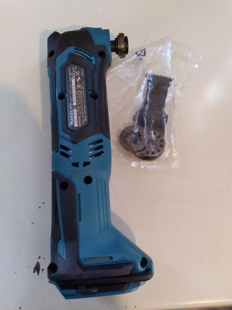 Brand new 12v makita oscillating multi tool set.