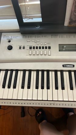 Yamaha YPG-245 keyboard with stand and sustain pedal