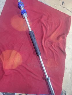 OLYMPIC 5' BAR.   30LBs WITH LOCKJAW COLLARS AND NECK PAD.   IN GOOD CONDITION