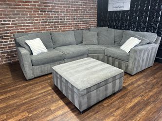 Free Delivery-Maceys gray 4pc sectional sofa couch + storage ottoman retails 2478