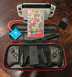 Nintendo Switch OLED Bundle - Super Mario Odyssey, Hori Split Pad Pro, Travel Dock & Case