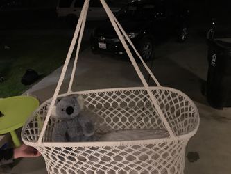 Crocheted hanging bassinet