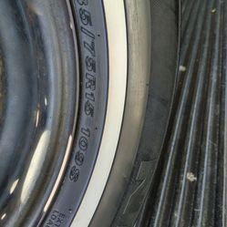 TR. TIRE PRACTICALLY NEW, NO CRACKS OR PLUGS, PATCHES; I CLEANED IT A LITTLE,COMES WITH RIM