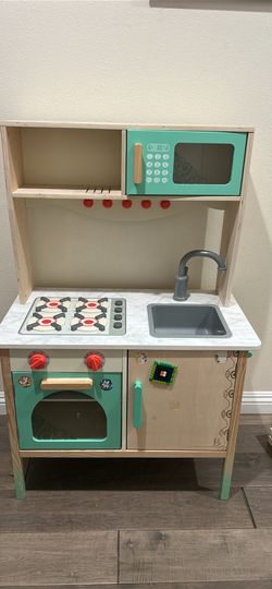 Kids toy kitchen with accessories