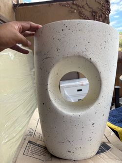 Oval shaped coffee table with hole in the middle