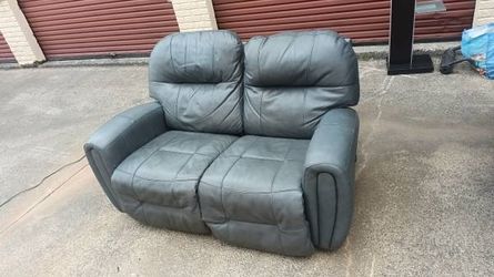 Leather  recliner love seat