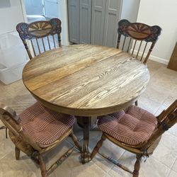 42” Round Table With 4 Chairs (plus one leaf)