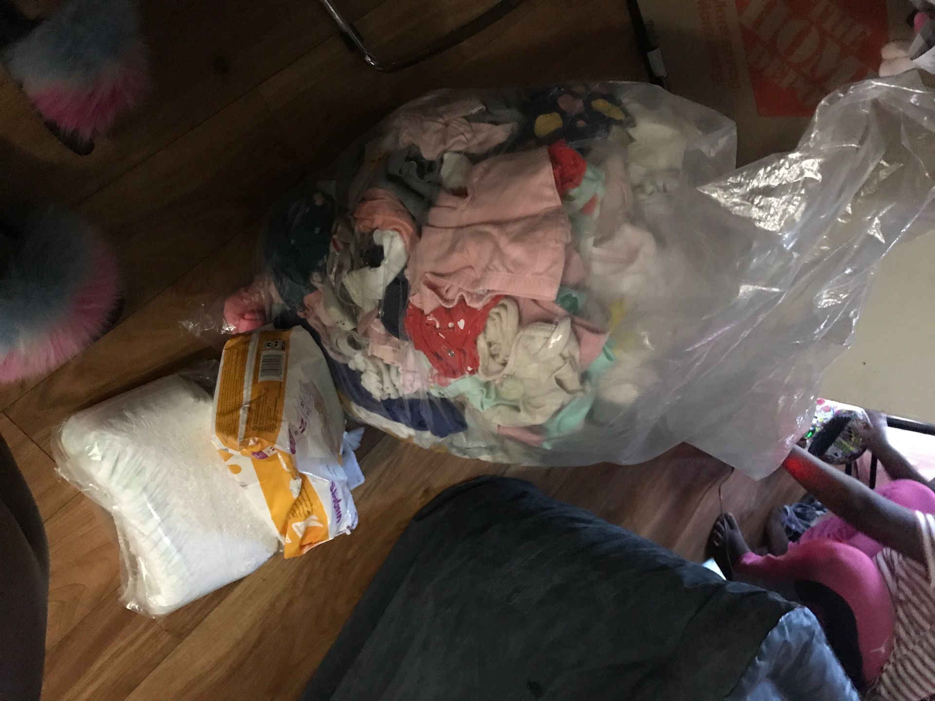 2 Bag of girl baby clothes and 2 pack newborn diapers