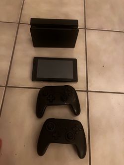 Nintendo Switch with 2 Controllers