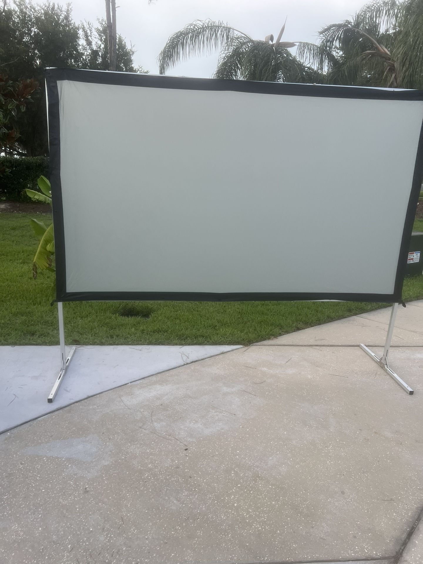 Elite Screens 2 120" Indoor/ Outdoor Projection Screen Minor Imperfections Read. Used in good condition with some minor cosmetic blemishes and imperf