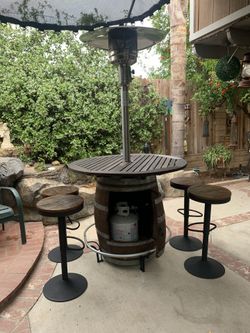 Beautiful Barrel Table , 4 Stools , Table Has Umbrella Holder That  Can Be Switch To Use With Heater  Umbrella And Heater Included, Not GasTank