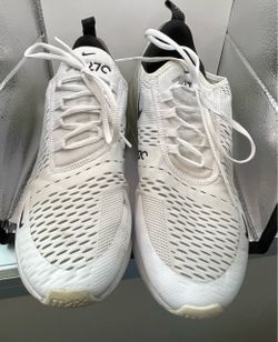 Size 11. A pair of white and black Nike Air Max 270 casual sneakers.