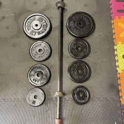 Weight Plates.  / Bar.    80 Dollars 