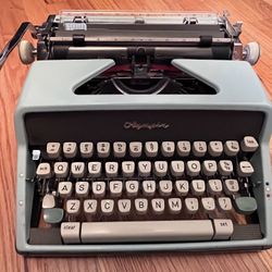 Beautiful Light blue Olympia SM7 Typewriter