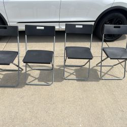 Black Plastic Folding Chairs 4 Pack 