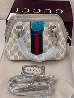Small khaki purse with box for women