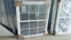 White Double Hung Window with Grilles