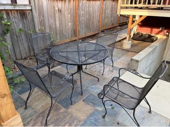 Woodard patio table and chairs