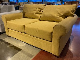 LIVING SPACES Low Mustard 2-Cushion Sofa