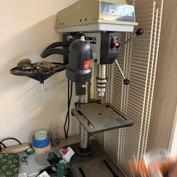 delta drill press like new with multiple attachments!