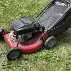 : "Vintage 2-Stroke Push Lawnmower: Powerful Motor, Restoration Project"