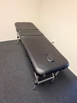 Massage table