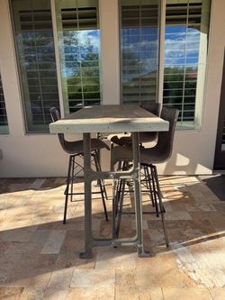 Four Hands Industrial Table and 3 Barstools