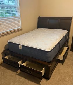 Rooms to go Dark Wood Storage Bed Frame and Serta mattress