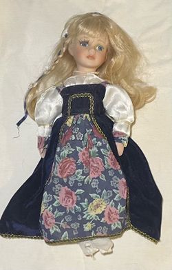 Heirloom collection ornamental porcelain doll limited edition