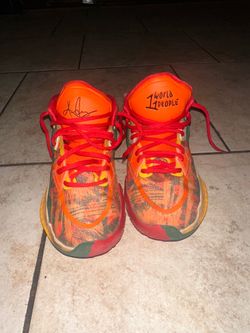 Nike Kyrie Infinity basketball shoes in the "1 World, 1 People" colorway.