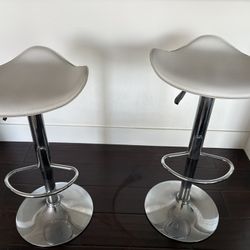 Pair of Leather Bar Stools — $140 (for both)