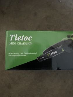 Mini chainsaw New In box